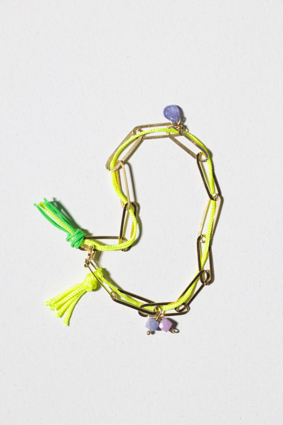 Gold-plated bracelet with neon thread, phosphosiderite and tanzanite