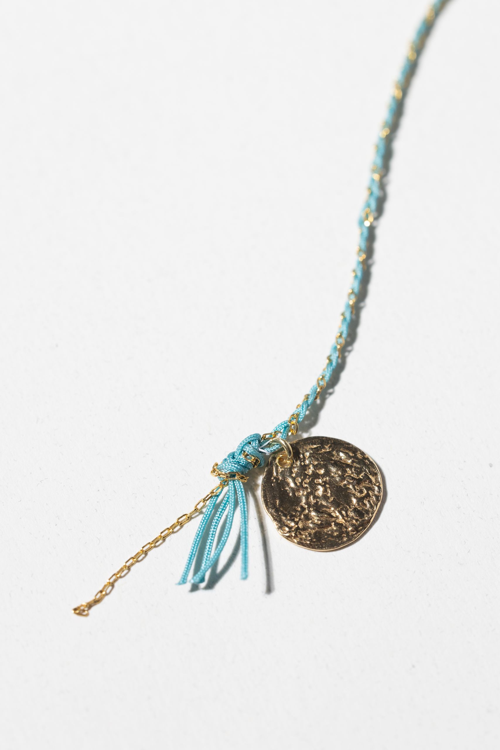 Gold-plated necklace made with turquoise nylon thread - Image 6
